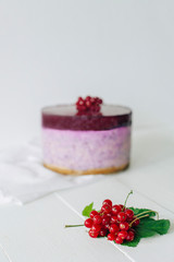 Chef cooking ceesecake with currant. Selective focus. New York Cheesecake.