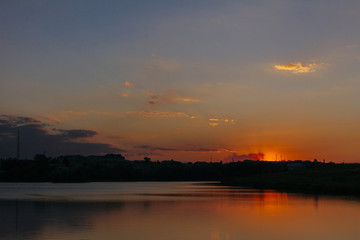 Dramatic sky over the idyllic sea at sunset