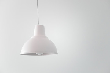 Сeiling white lamp on cable isolated on white background