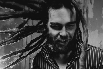 Male portrait. Man with the dreadlocks. Theater art.