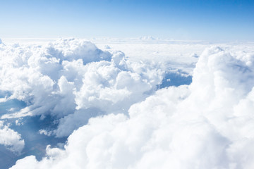 Fototapeta premium Clouds and sky from airplane window view