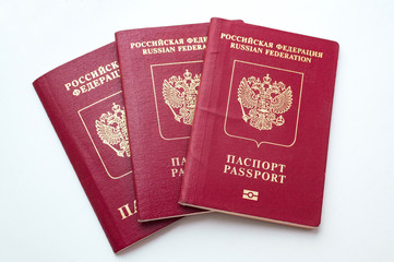 Three passport of the citizen of the Russian Federation on a white background
