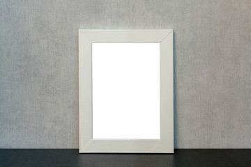 one large empty white frame for picture on the shelf, wallpaper, mock-up