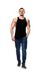 Fototapeta premium Portrait of strong athletic young man in black t-shirt