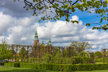 Denmark Copenhagen Rosenborg Castle and Gardens in summer blue cloudy sky