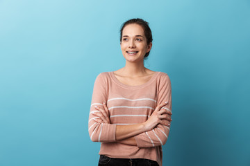 Cute lovely young girl standing isolated