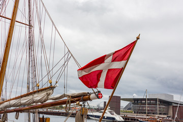 Danish flag on blue sky summer time