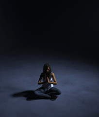 Woman meditation in the dark,3d rendering