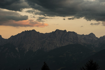 coming thunderstorm in mountains in Alps, gray sky