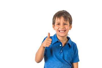 Child boy showing thumbs up on white background.