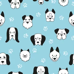 Deurstickers Honden Naadloze schattige honden patroon. Vector blauwe achtergrond met honden hoofden.