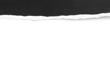 Ripped paper on black background, space for advertising copy.