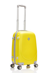 yellow wheeled colorful suitcase with handle isolated on white