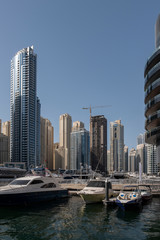 Fototapeta na wymiar Hot sunny day in Dubai Marina. UAE. May, 2019.