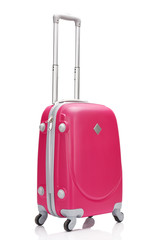 red plastic wheeled colorful suitcase with handle isolated on white