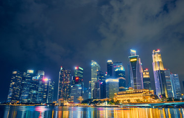 Fototapeta na wymiar Skyscrapers at night in Singapore
