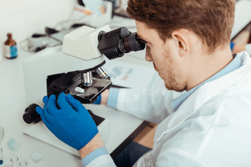 Top view of a smart professional biologist