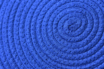Blue rope or thread spiral or swirl background
