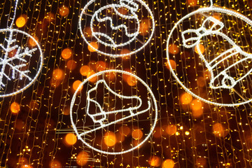 Christmas illumination on downtown street.