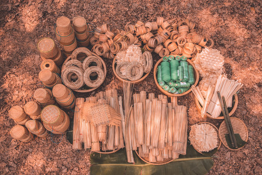 Materials and equipment of thai OTOP product from dry Catathea grass weave as basketry.