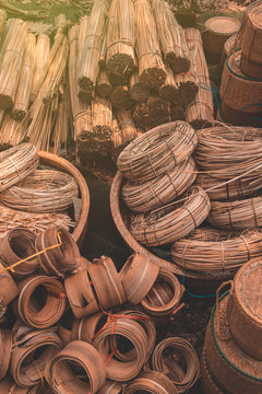 Materials and equipment of thai OTOP product from dry Catathea grass weave as basketry.