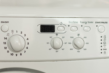 Washing machine control panel close-up. Washing machine panel for choosing programs.