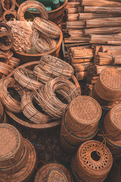 Materials and equipment of thai OTOP product from dry Catathea grass weave as basketry.