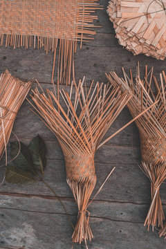 Materials and equipment of thai OTOP product from dry Catathea grass weave as basketry.