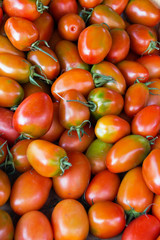 Little red tomatoes on a farmers market