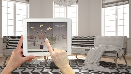 Smart remote home control system on a digital tablet. Device with app icons. Minimalist modern...