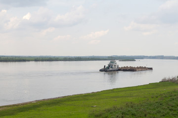 sand barge on the river