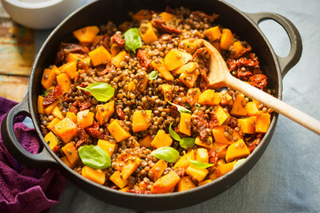 Pumpkin with lentils, sun dried tomatoes and basil 