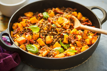 Pumpkin with lentils, sun dried tomatoes and basil 
