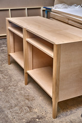 Chest of drawers building process. Wooden furniture manufacturing process. Furniture manufacture. Close-up