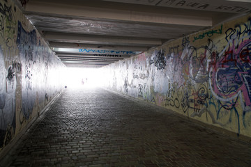 Pedestrian crossing tunnel, Dark and long underground passage with light