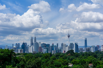 Monsoon  view over downtown Kuala Lumpur (KL). KL is the capital of Malaysia. Its modern skyline is dominated by KLCC, KL Tower and Exchange106. 