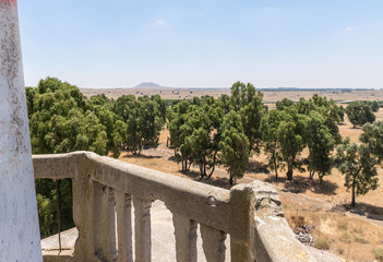 View from the minaret balcony of the ruined mosque Horvat Khushniya remaining after the war of the...