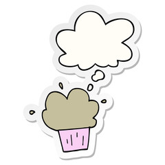 cartoon cupcake and thought bubble as a printed sticker