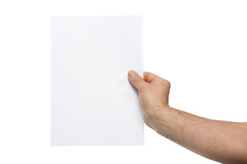 Male hand holds blank paper isolated on white background.