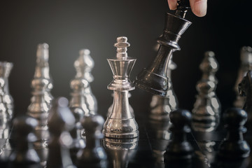 King and Knight of chess setup on dark background . Leader and teamwork concept for success.