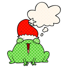 cute cartoon christmas frog and thought bubble in comic book style