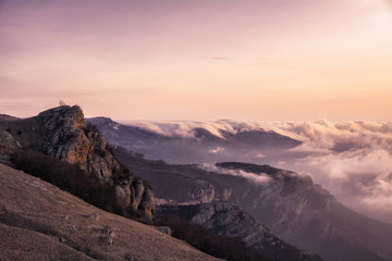 Obraz na płótnie Canvas Sunset light in the Demerdzhi mountain range in the Valley of ghosts