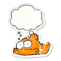 cartoon goldfish and thought bubble as a distressed worn sticker