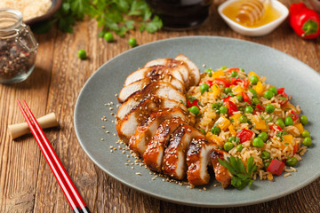 Grilled chicken breast in teriyaki sauce. Served with brown rice and vegetables.