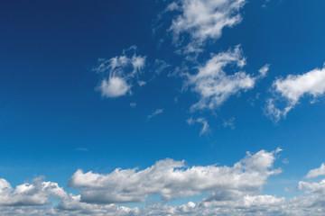 Fototapeta premium white clouds in bright blue sky