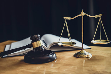 Judge gavel with Scale of justice, object documents working on table in courtroom, Legal law advice...
