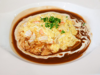 Egg-wrapped shrimp menu with sauce