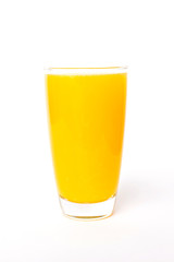 Fresh orange juice in glass isolated on white background