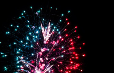 Colorful fireworks in the sky on black background