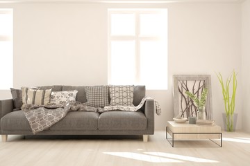Stylish room in white color with sofa. Scandinavian interior design. 3D illustration